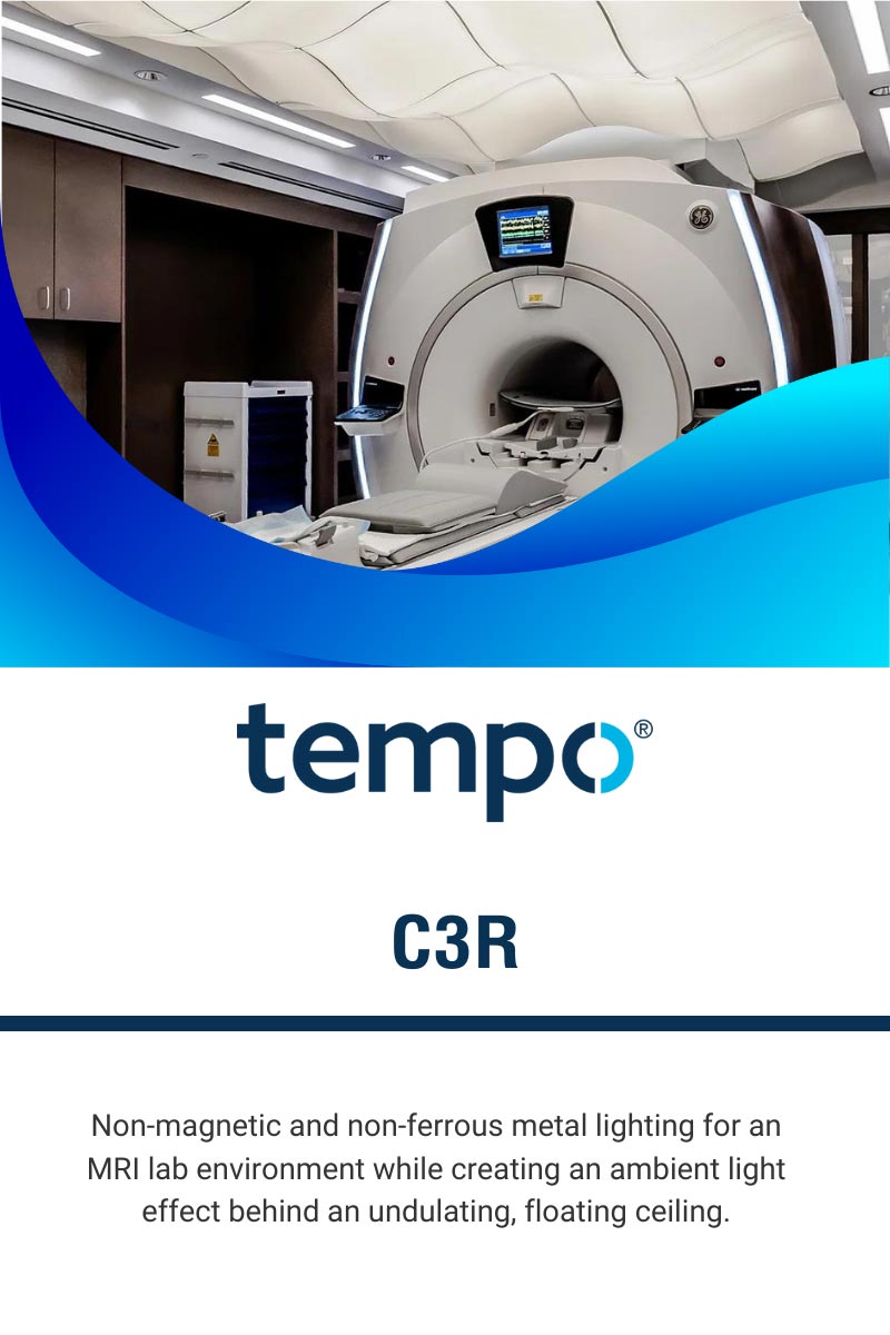Non-magnetic and non-ferrous metal lighting for an MRI lab environment while creating an ambient light effect behind an undulating, floating ceiling.